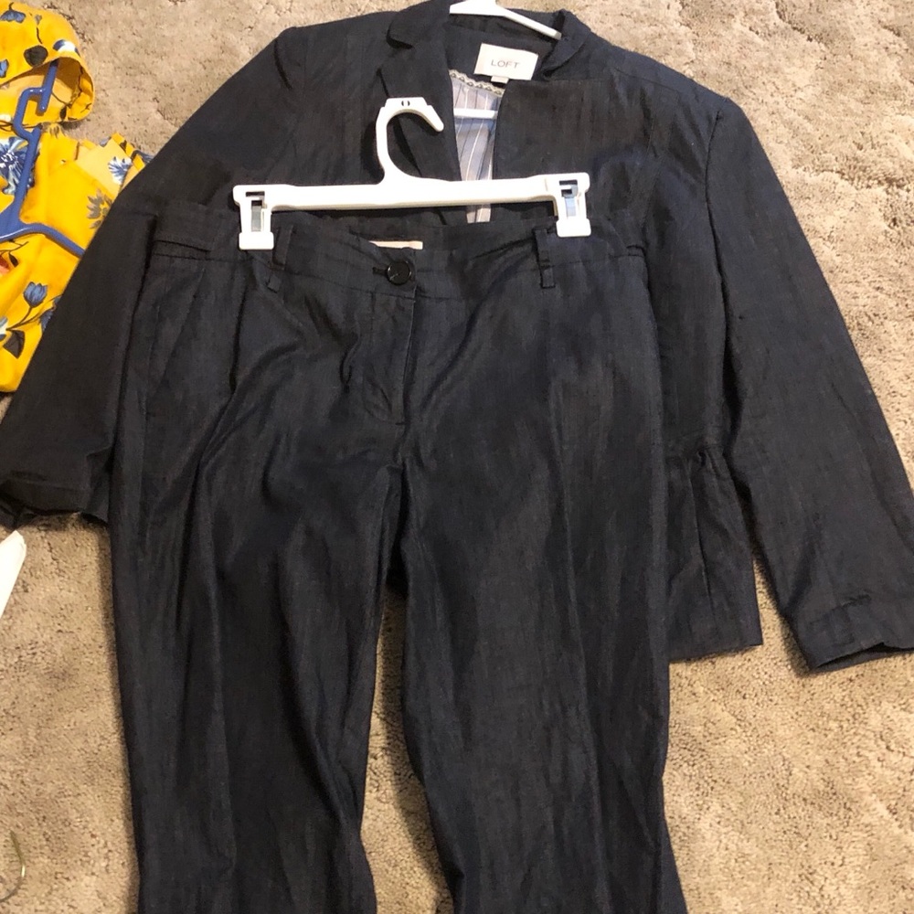 A jean blue suit.